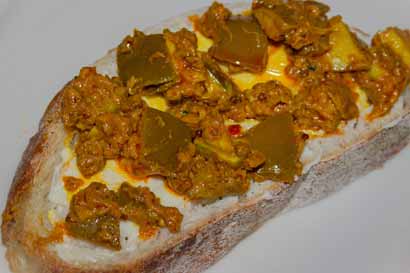 mango-pickle spread onto bread